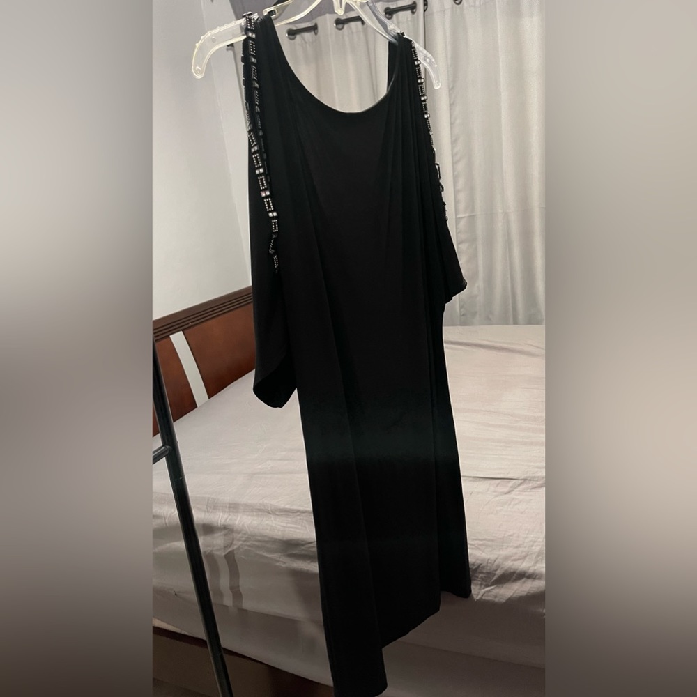 Little Black Dress • Chic • Stylish • Billowed sleeves • Drapey • Alluring back